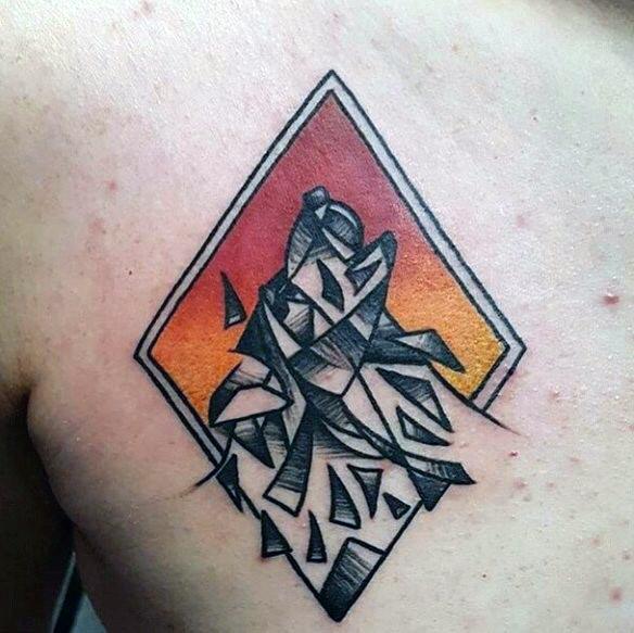Geometric wolf tattoo with abstract black shards, set inside a diamond frame with a gradient sunset background in orange and red.