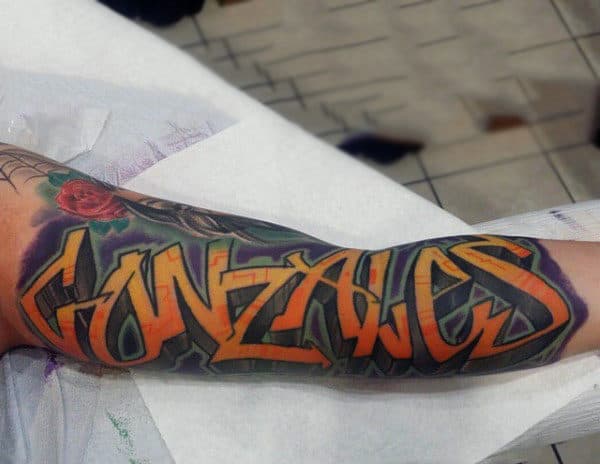 Graffiti Guys Tattoo On Forearm