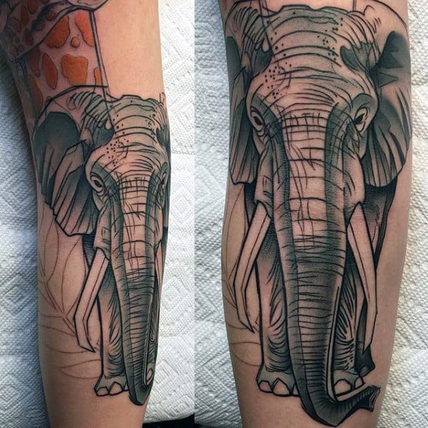 Detailed elephant tattoo with intricate shading on a forearm