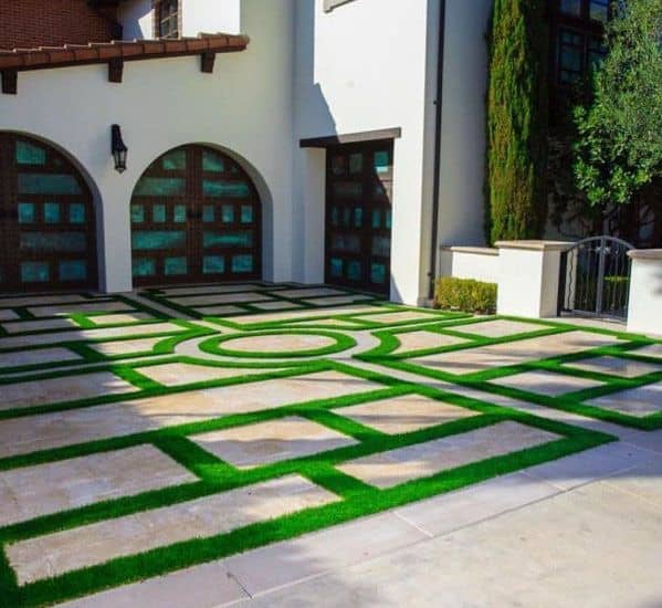 concrete paver driveway with grass joints