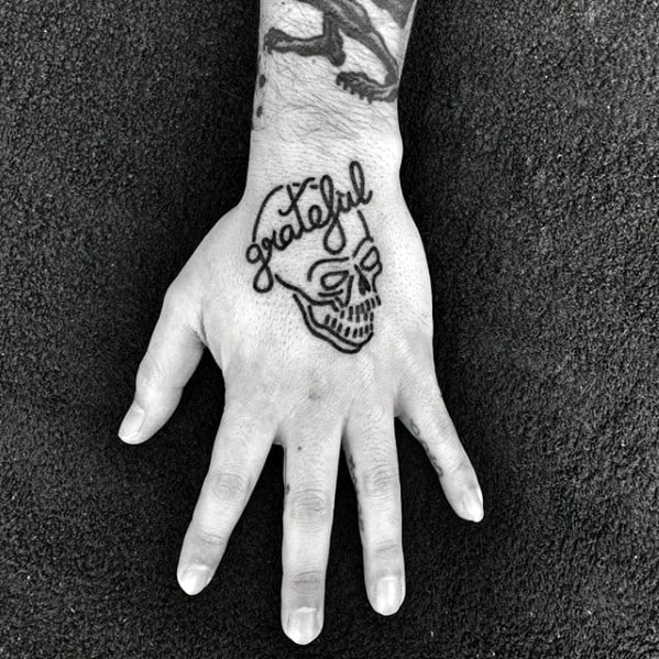 Grateful Lettering With Skull Mens Simple Hand Tattoos