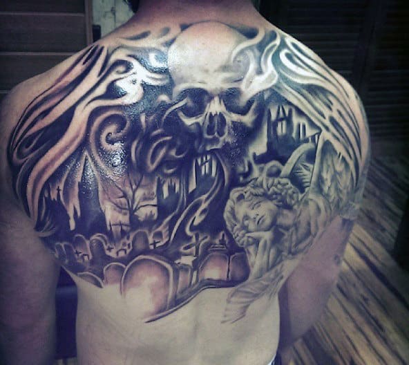 Back tattoo featuring a skull, a graveyard scene, and an angel in a detailed, dark design