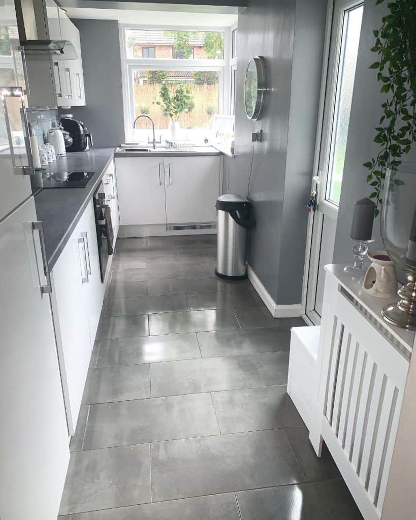 white cabinet kitchen gray floor tiles