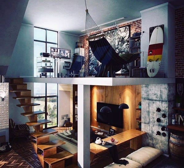 Hammock in a modern loft with exposed brick walls, surfboard decor, and stylish furnishings.