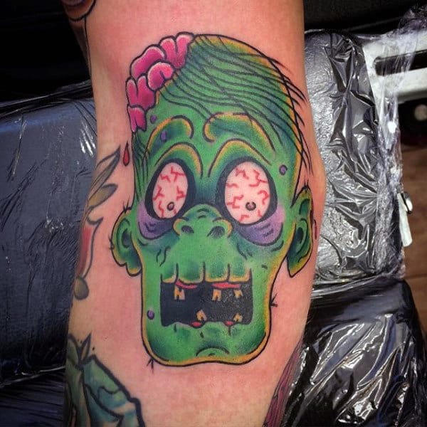 Green Faced Zombie Mens Cartoon Style Bicep Tattoo Inspiration