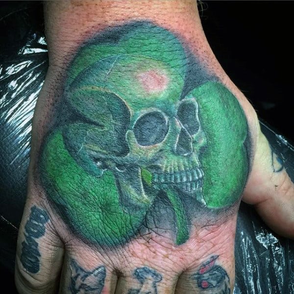 Green Guys Hand Skull Shamrock Tattoo