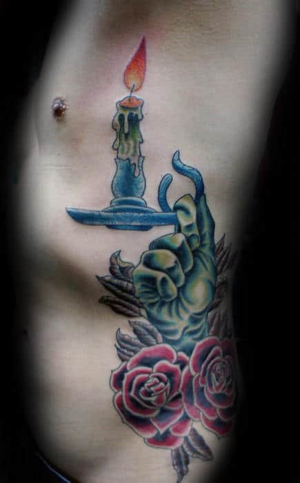 Green Monster Hand Holding Candle Guys Traditional Rib Tattoo