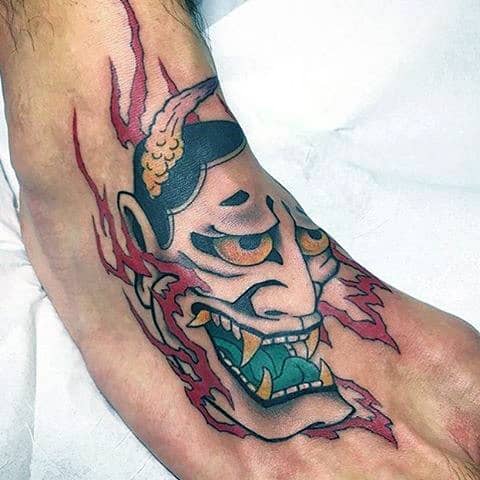 Green Tongued Ogre Tattoo On Foot