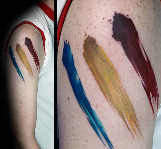 Green Yellow And Blue Brush Stroke Lines Mens Upper Arm Tattoo