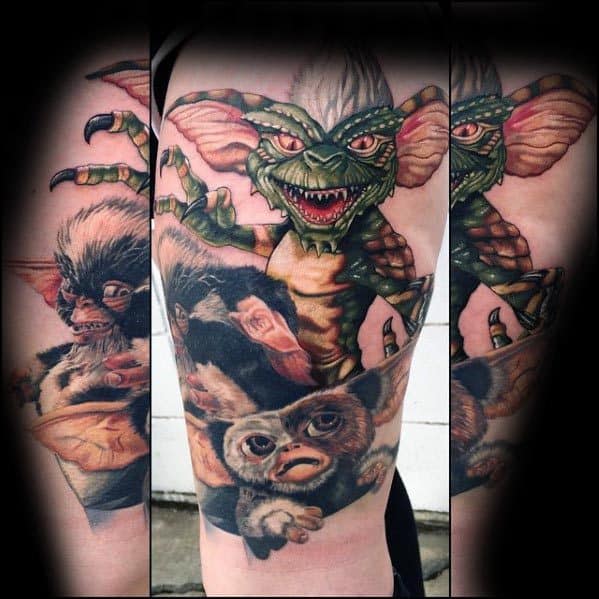 Detailed Gremlin tattoo sleeve featuring a fierce green Gremlin above and multiple Gizmo variations below, blending horror and cuteness.