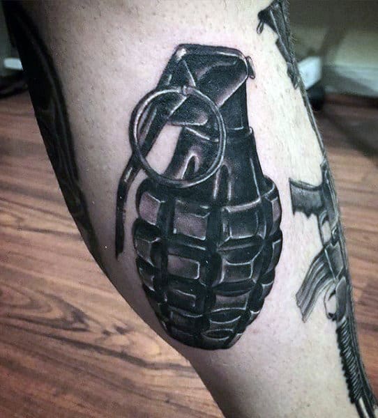Grenade Tattoo On Men's Calf