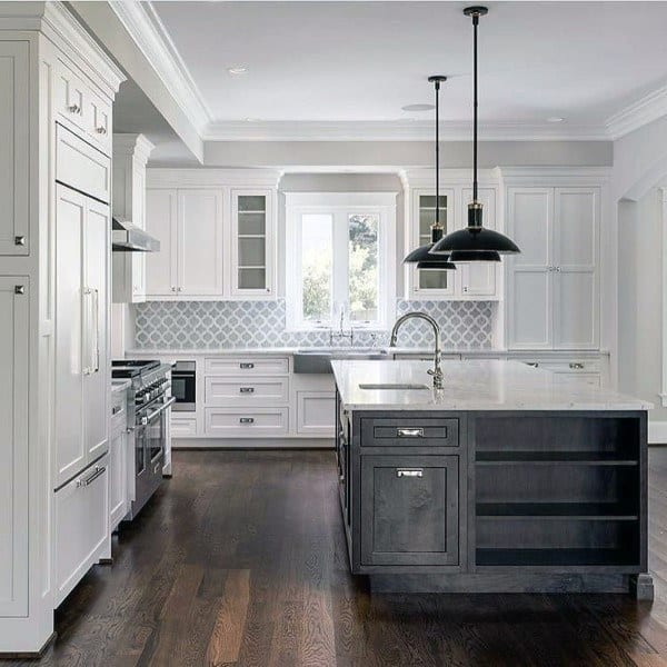 white cabinet farmhouse kitchen with low hanging pendant lights
