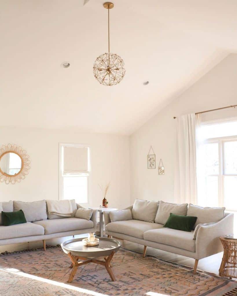 high ceiling white living room gray sofas large pattern floor rug small gray table