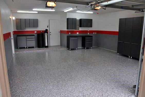 white and gray two tone wall with red stripe garage black and gray cabinets