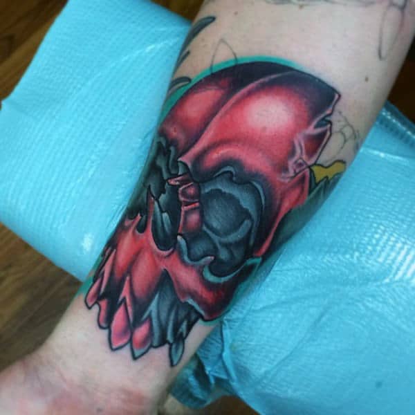 Grey Red Skull New School Tattoo Male Forearms