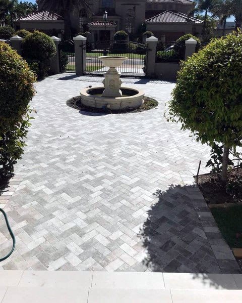 driveway landscape with water feature