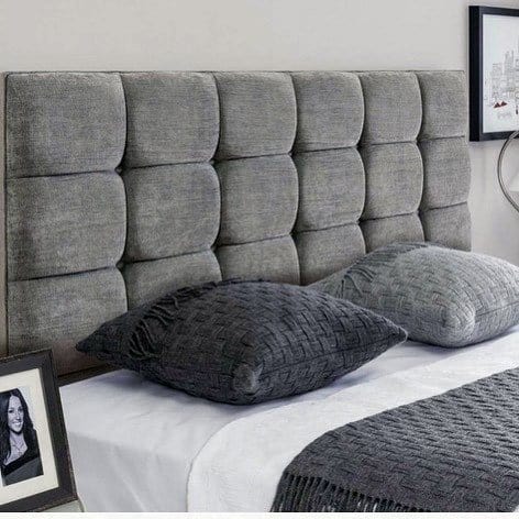 thick gray padded bedroom headboard