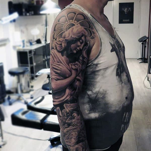 Guardian Angel Tattoo With Disk On Mans Arms