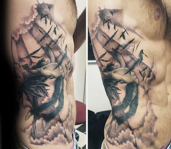 Gus Flying Icarus Rib Cage Side Tattoo Design Ideas