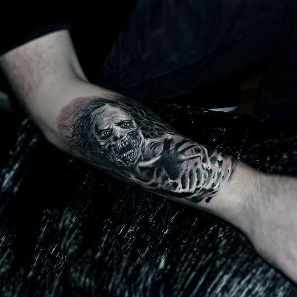 Guy With 3d Zombie Tattoo On Arm