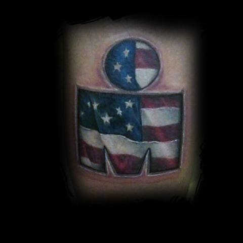 Ironman logo tattoo filled with the American flag design, featuring bold red, white, and blue colors.