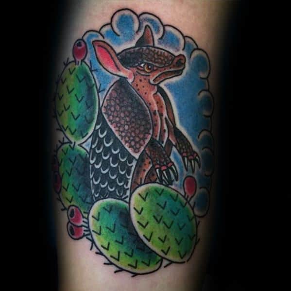 Guy With Armadillo Tattoo Design On Arm