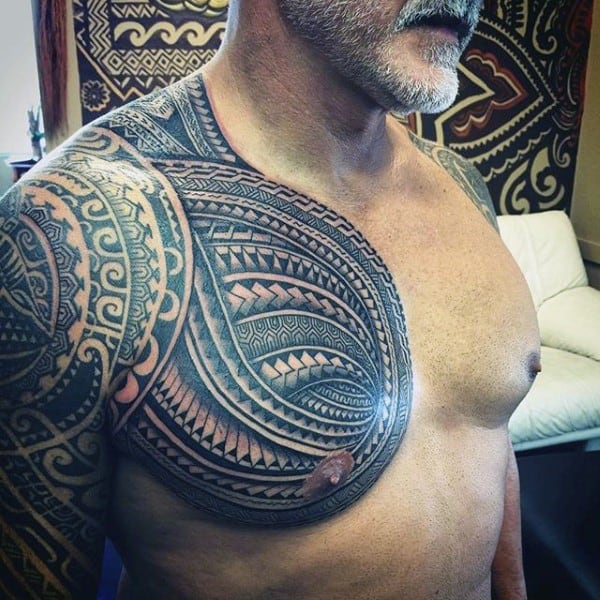 Guy With Awesome Samoan Tribal Chest And Arm Tattoo Design