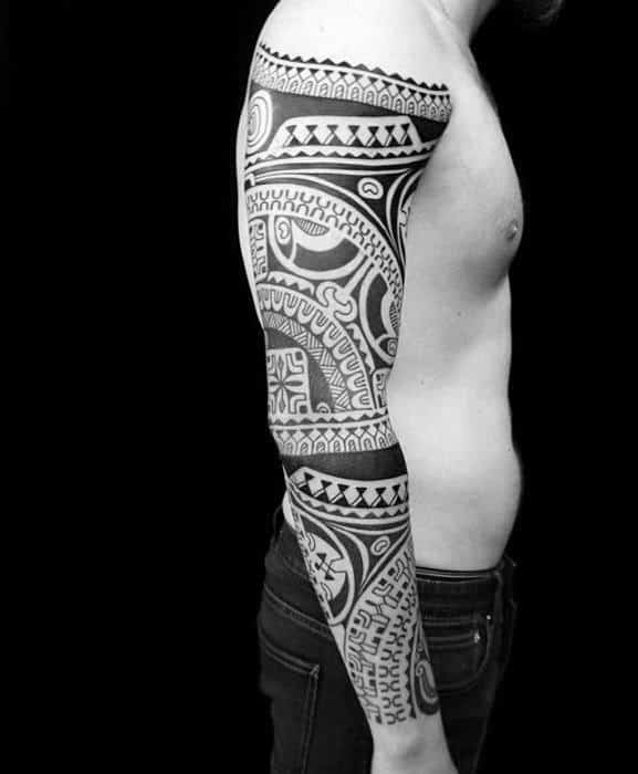 Guy With Awesome Traditional Tribal Full Arm Sleeve Tattoo Design