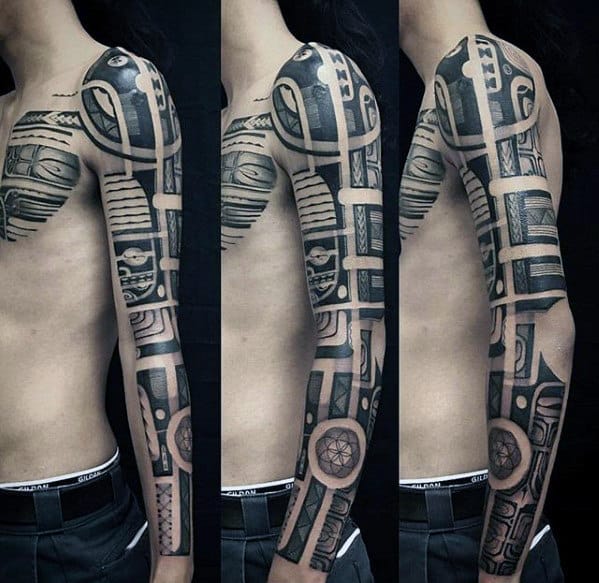 Guy With Awesome Tribal Full Arm Sleeve Tattoo
