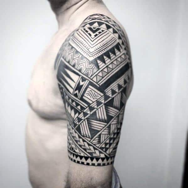 Guy With Badass Tribal Half Sleeve Detailed Pattern Tattoo Design