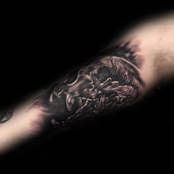 Guy With Bear Skull Arm Tattoo Design