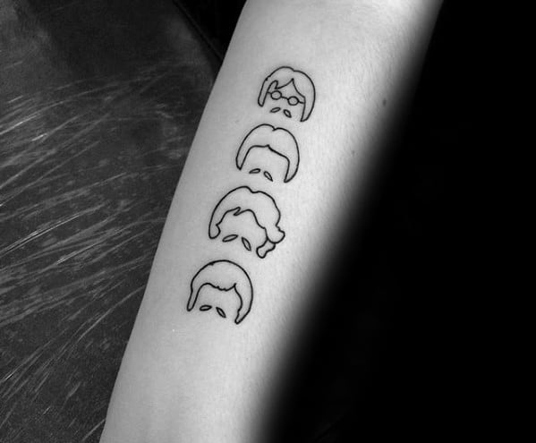 Minimalist Beatles tattoo with four iconic hairstyles and mustaches representing the band members in simple black linework.