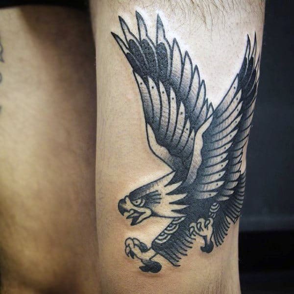Guy With Beautiful Ethnic Baldeagle Tattoo On Arm