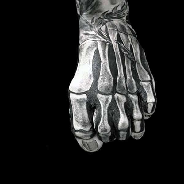 Guy With Bony Anatomy Of Foot Tattoo