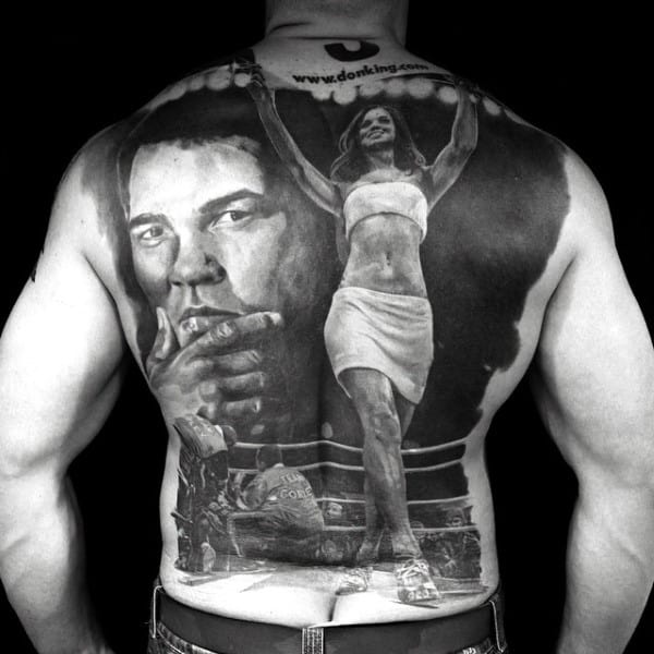 Guy With Boxing Champ And Cheer Leader Tattoo On Full Back