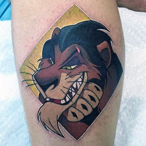 Bold and colorful tattoo of Scar from The Lion King with a sly grin, framed in a diamond shape and shaded with warm, dramatic tones.