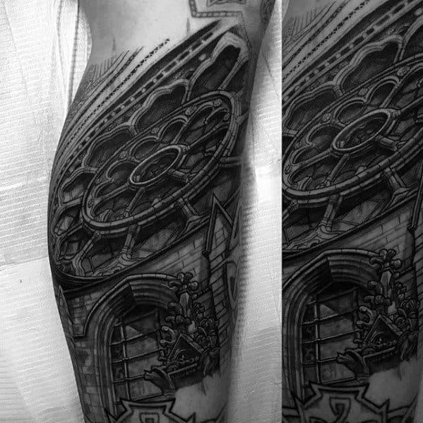 Realistic sleeve tattoo of a gothic cathedral facade with a large rose window, detailed stone carvings, and intricate architectural lines.
