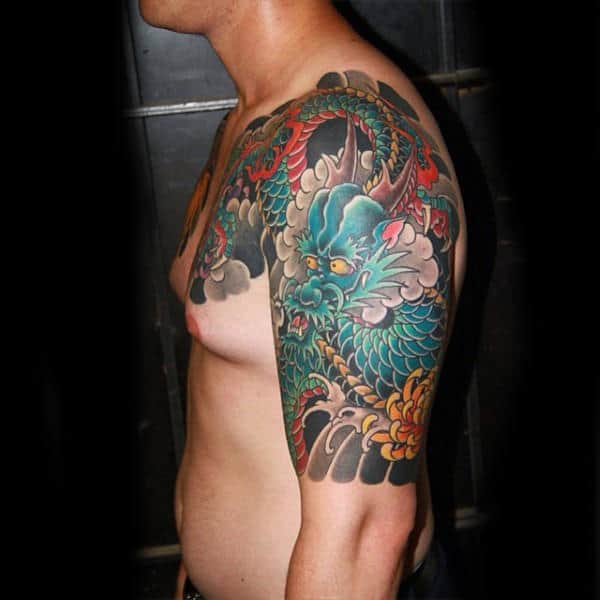 Guy With Celestial Dragon Tattoo Sleeves
