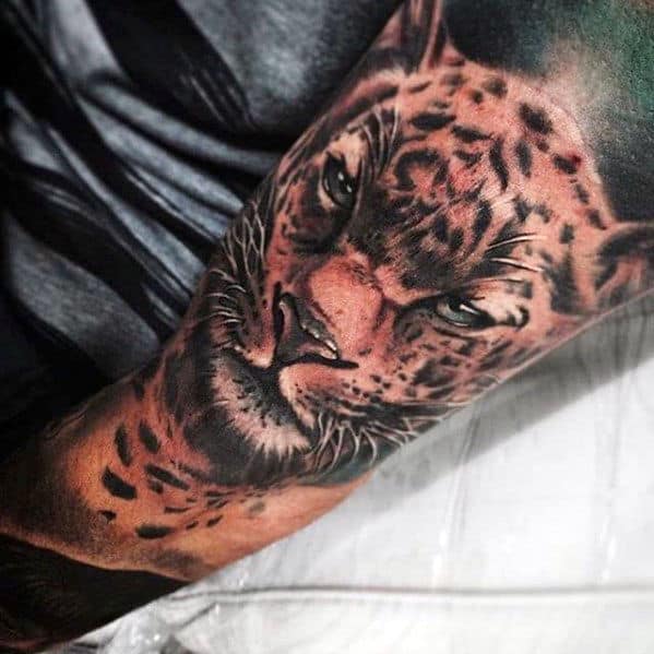 Guy With Cheetah Arm Sleeve Tattoo Designs