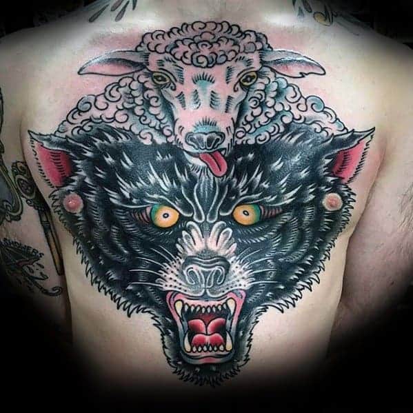 Tattoo of a black wolf with yellow eyes snarling, topped by a sheep's head, on a back