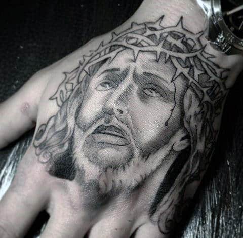 Guy With Christian Jesus Christ Tattoo Design On Hand