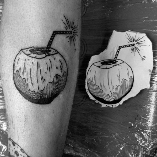 Black ink tattoo of a round coconut with textured detailing and a striped straw, topped with a spark, placed on the lower leg.