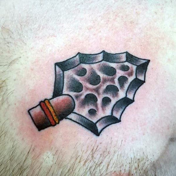 Guy With Cool Arrowhead Tattoo On Torso