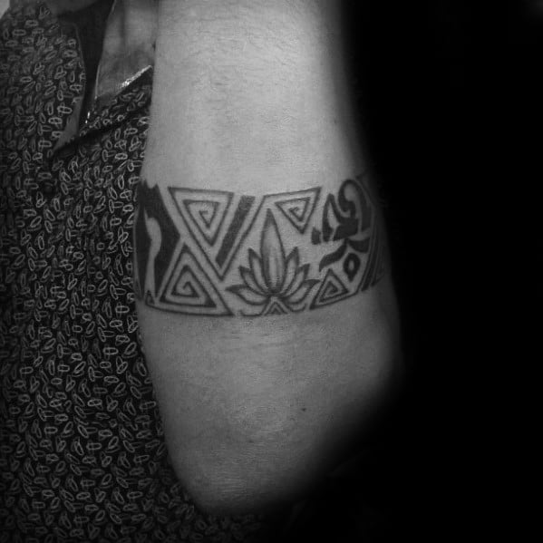 Guy With Cool Pattern Tribal Forearm Band Tattoo Design