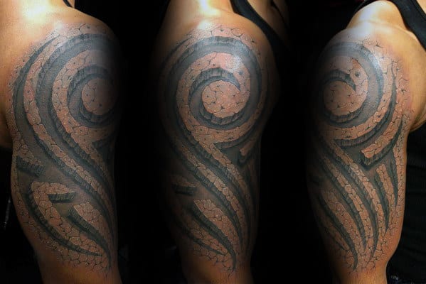 Guy With Cool Tribal Arm Tattoo