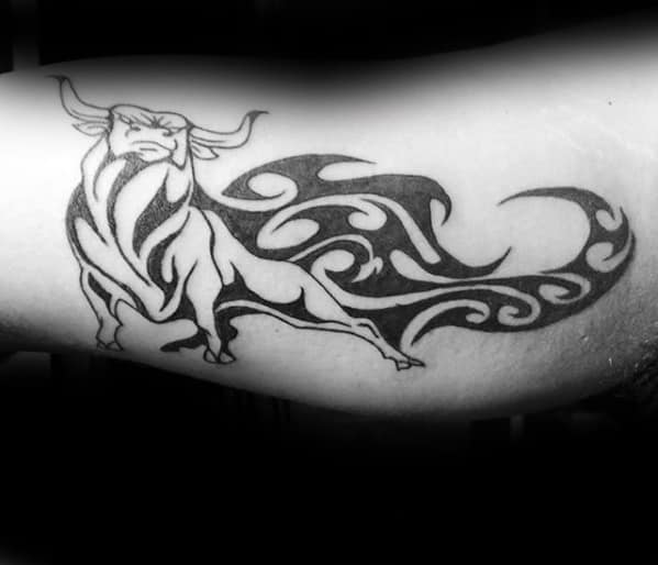 Guy With Cool Tribal Bull Tattoo On Inner Arm Bicep