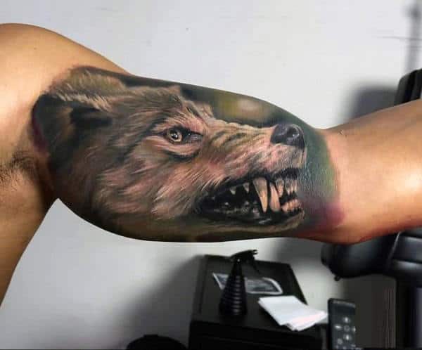 Guy With Cool Watercolor Wolf Inner Arm Tattoo