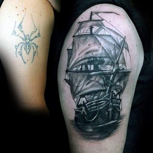 Guy With Cover Up Shaded Sailing Ship Arm Tattoos