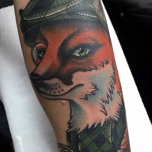 Guy With Crafty Female Fox Tattoo On Forearms