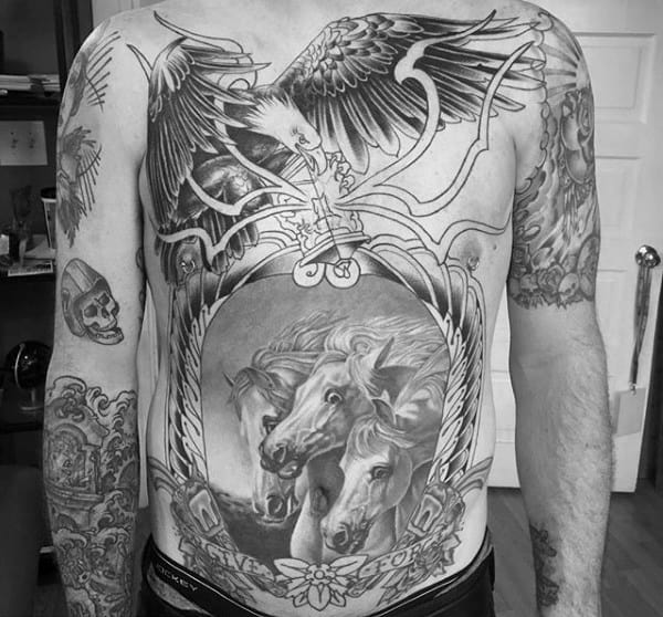 Guy With Crazy Horse And Eagle Full Chest Tattoo